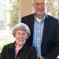 Robert and Ellen Thompson posing for a photo.